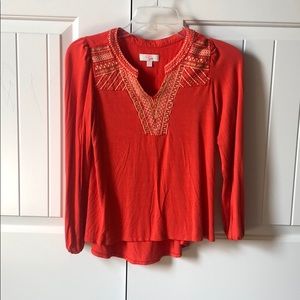 Women’s orange blouse